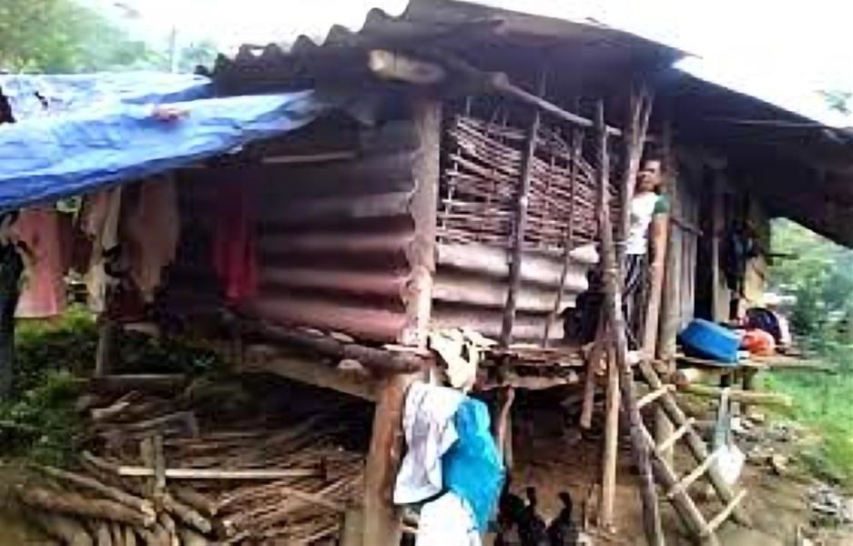 Hands holding a child sponsorship photo card