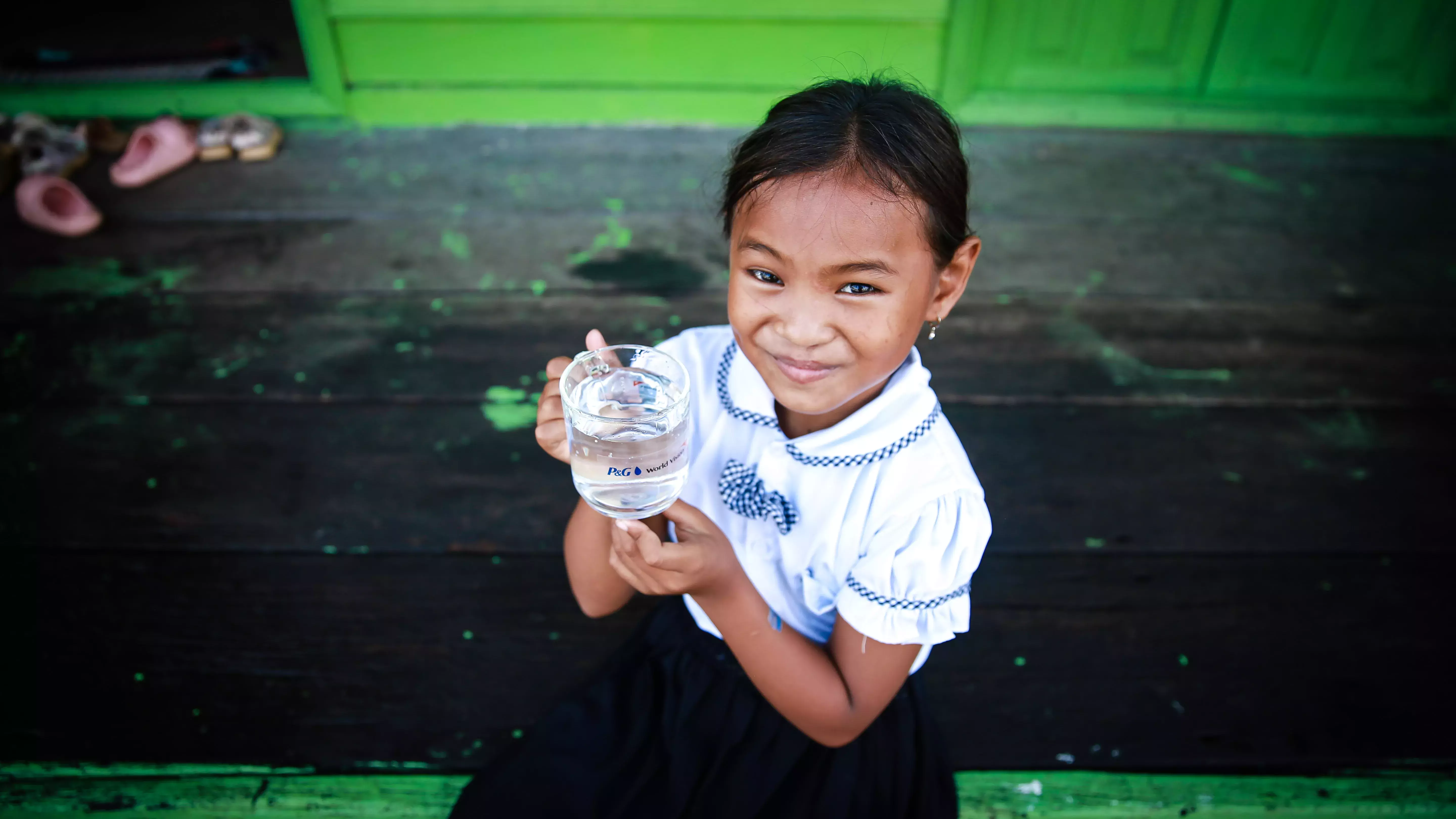 girl with a cup of water