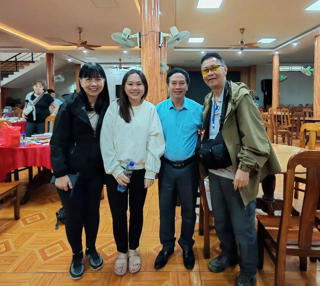 Adeline with Mr Hien, the Muong Cha Area Programme Manager (second from right) 