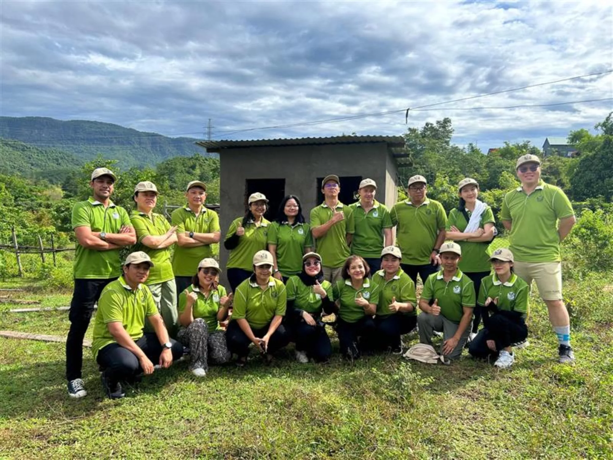 Team in front of constructed latrine