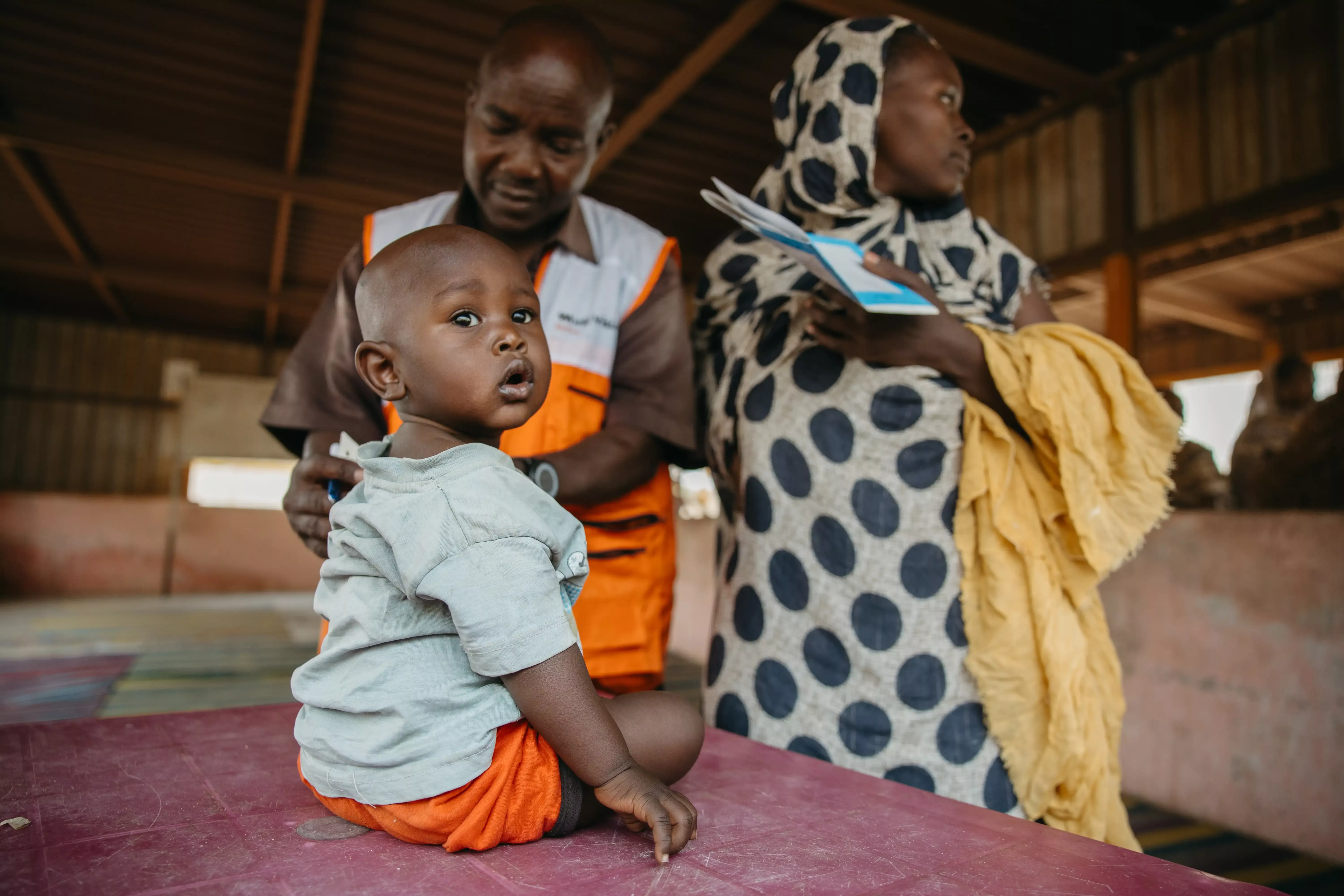 Child in a World Vision health clinic in Sudan