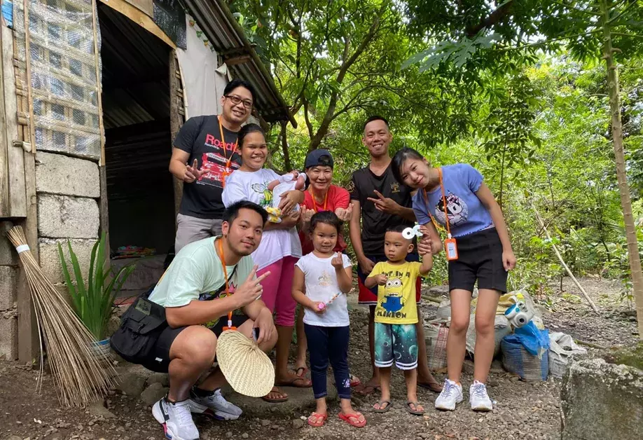 Sponsors visiting children in Antique