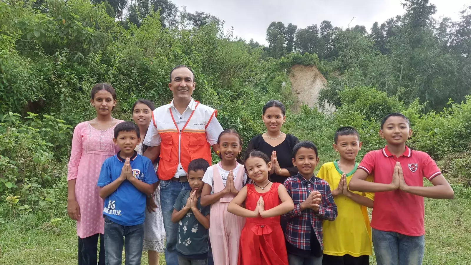  Children from Sindhuli East with World Vision Nepal Staff