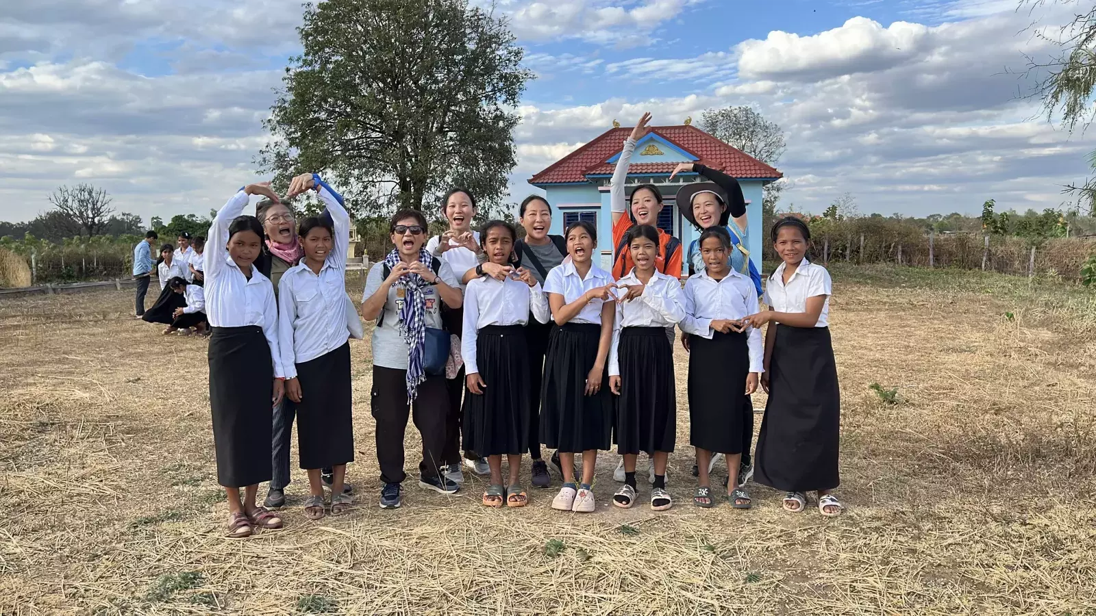 Child Sponsors from Singapore visiting children in Cambodia